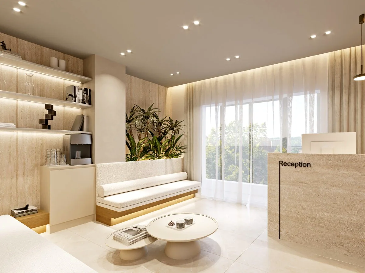 Clinic reception in pale timber with a travertine desk